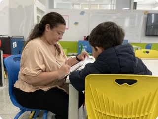 Teacher giving personalized class to student